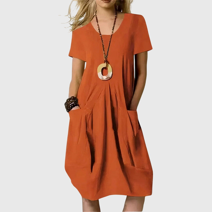 Women's Naomi casual A-line dress with pockets, offering effortless style and comfortable versatility for everyday wear.