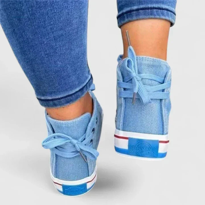 Women's orthopedic denim blue shoes with robust arch support, perfect for extended walking & everyday comfort.