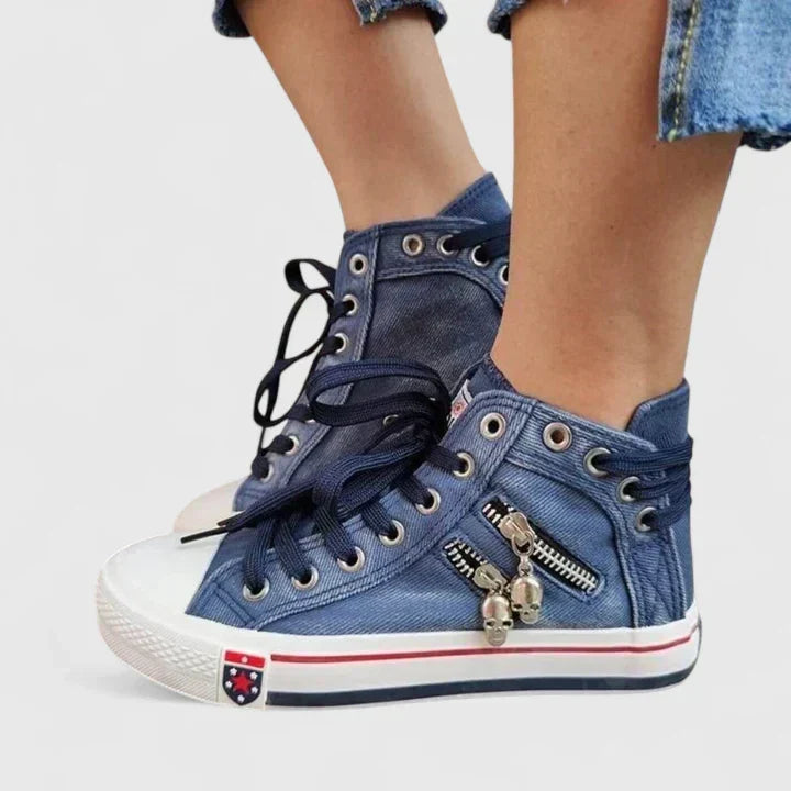 Pair of women's denim blue orthopedic comfort shoes, providing essential arch support for daily casual & smart wear.