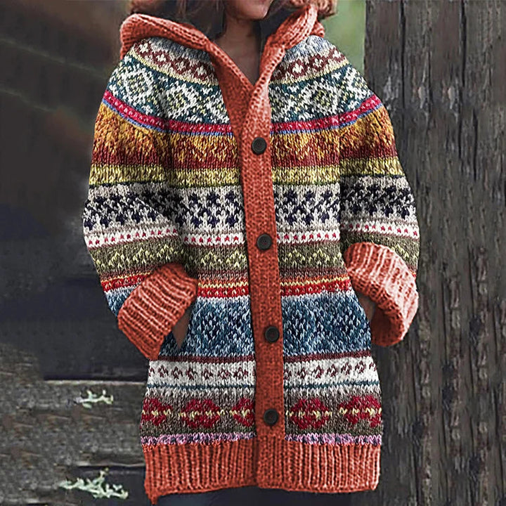 Close-up of Fair Isle knit pattern on a women's cozy hooded cardigan, long sleeve, for autumn/winter style.