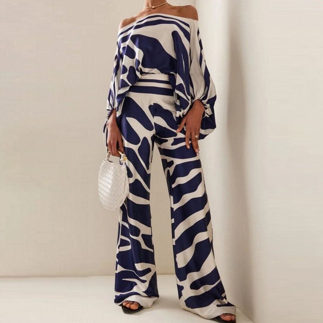 Lightweight women's off-shoulder printed two-piece set, essential for stylish summer outfits.
