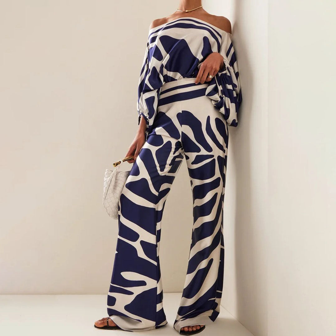 Relaxed fit women's off-shoulder printed two-piece set, comfortable casual wear for summer days.