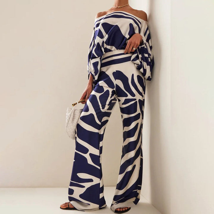 Relaxed fit women's off-shoulder printed two-piece set, comfortable casual wear for summer days.