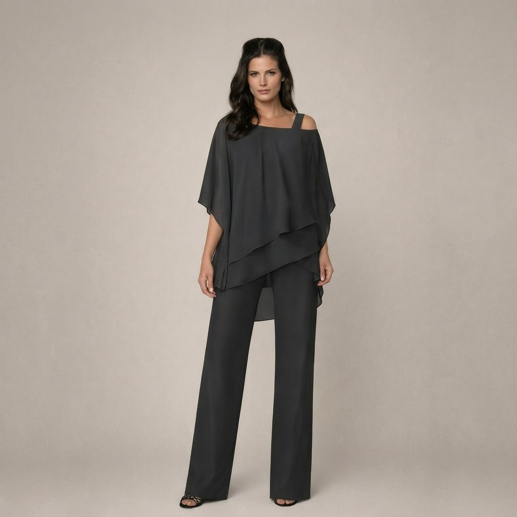 Chic women's off-shoulder blouse with flowy wide-leg pants. Comfortable summer two-piece set.