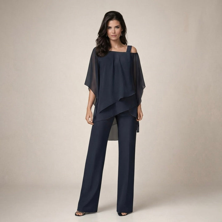 Stylish women's off-shoulder top paired with comfortable wide-leg pants. Fashionable two-piece set.