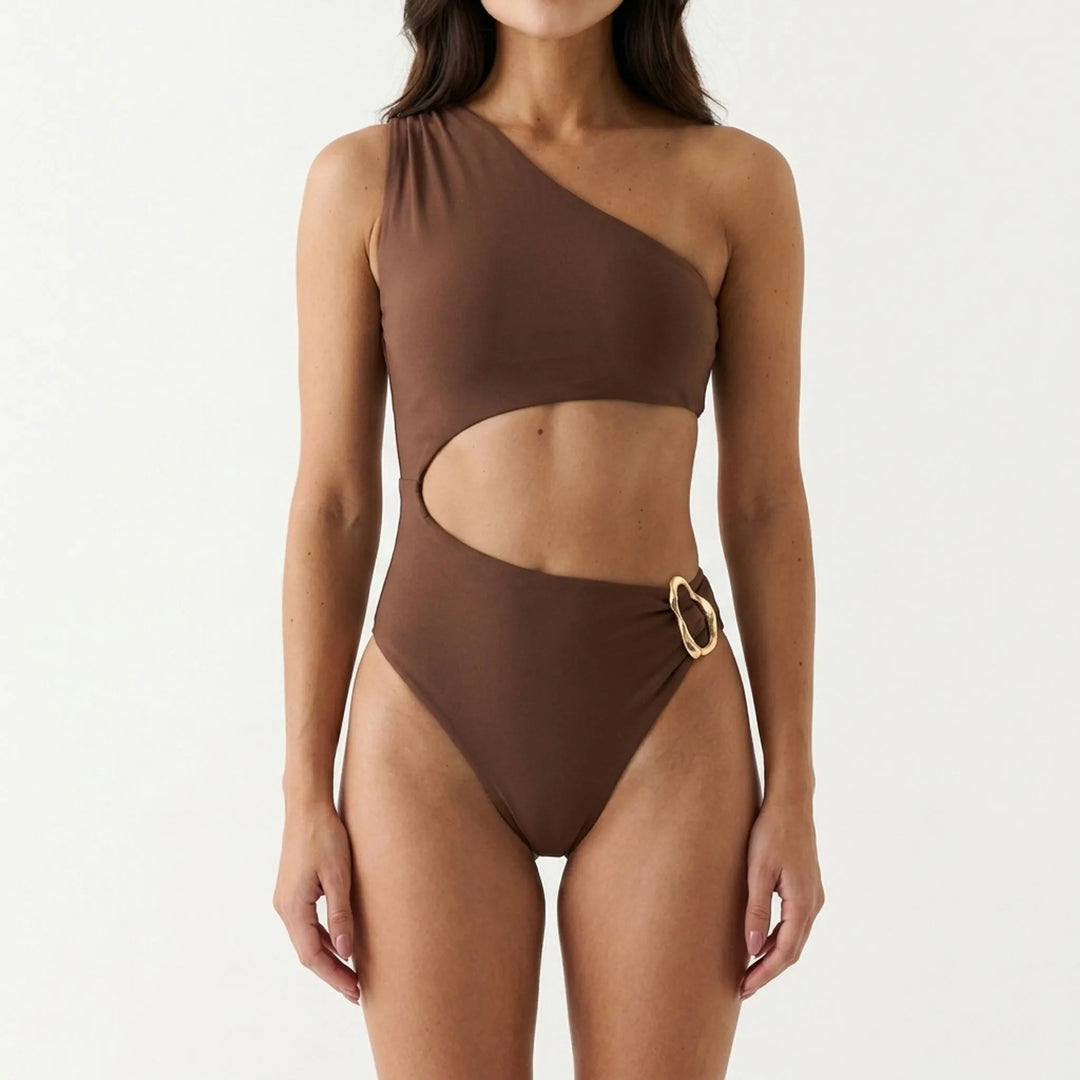 Trendy women's asymmetrical one-shoulder swimsuit with chic cut-outs. Ideal for summer beach fashion.