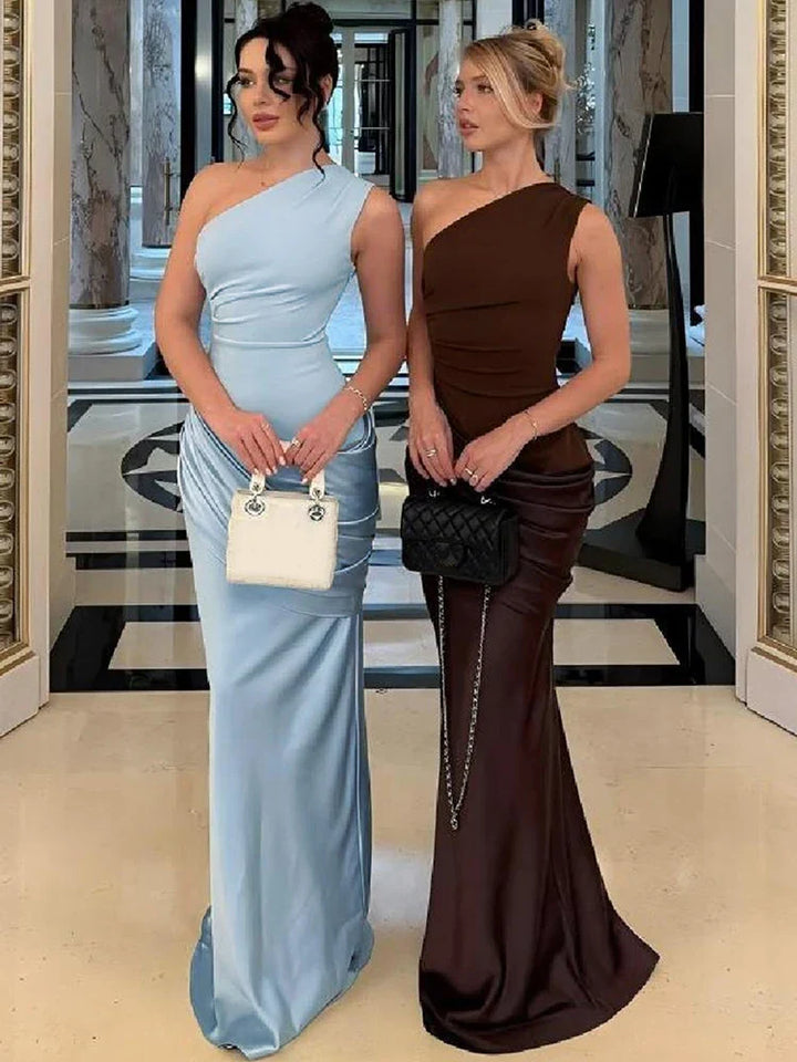 Formal women's one-shoulder maxi gown. Sophisticated and elegant for wedding guests & evening events.