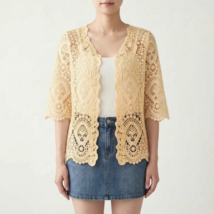 Bohemian women's open-front crochet-style cardigan, a lightweight and elegant piece for summer layering.