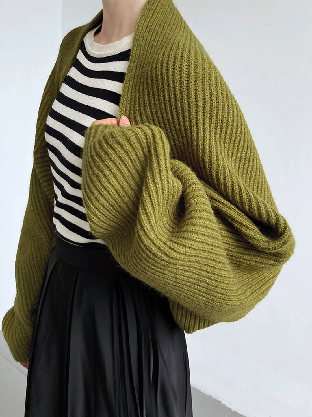 Stylish women's open-front long sleeve shrug. Comfortable, regular fit cardigan for chic layering.