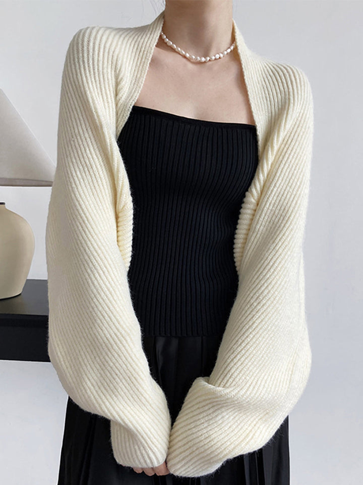 Chic women's long sleeve shrug sweater. Open-front, regular fit cardigan, a stylish addition to any outfit.