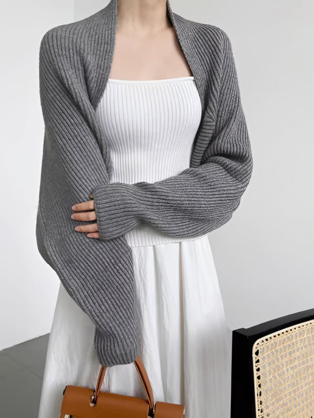Women's regular fit shrug sweater. Long sleeve, open-front design for comfortable, stylish everyday layering.
