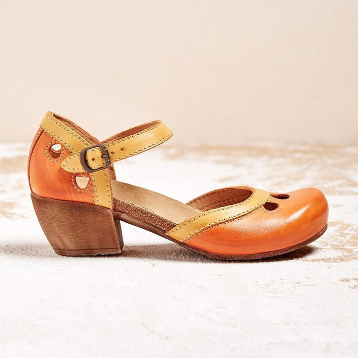 Comfortable women's open toe block heel sandals, featuring stylish cutout design & secure ankle strap.