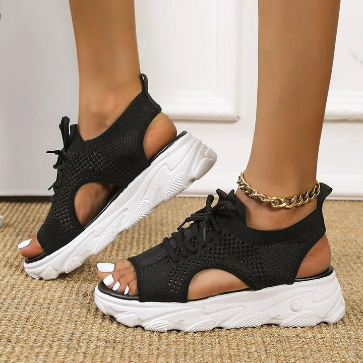 Women's open-toe platform sandals, lace-up casual footwear, ideal for stylish summer outfits.