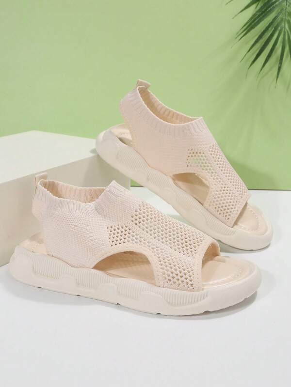 Fashionable women's open toe platform sandals, lightweight slip-on for relaxed summer style.