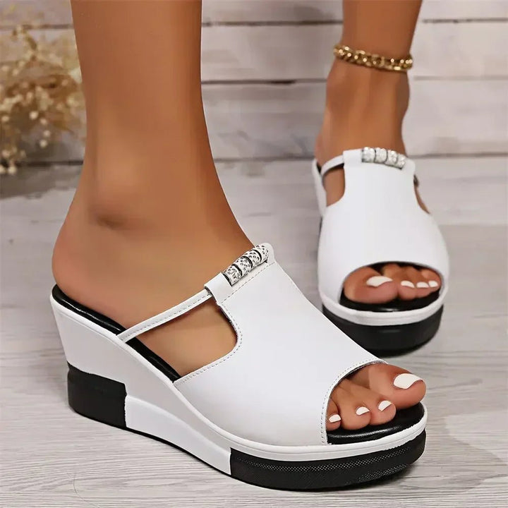 Stylish women's open-toe wedge platform slide sandals with rhinestone detail for summer.