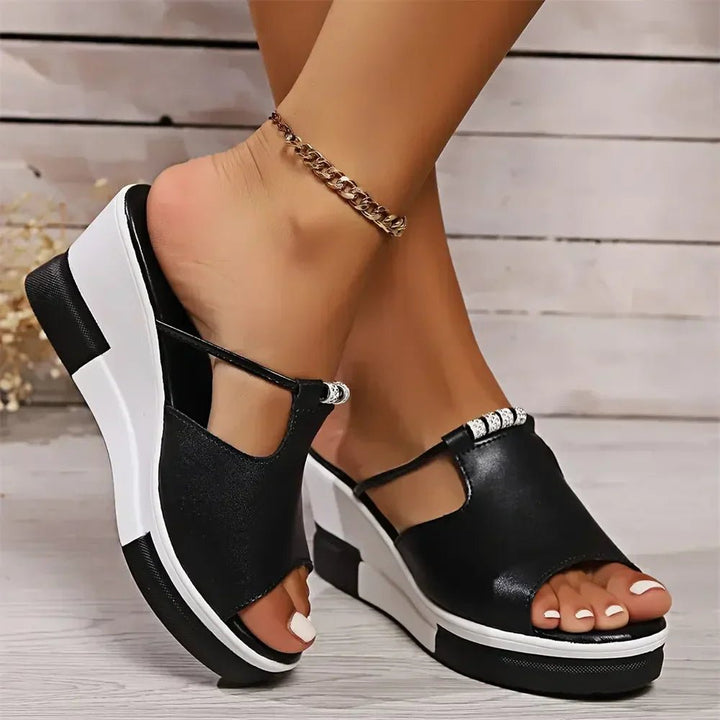 Comfortable slip-on open-toe platform wedge sandals for women. Ideal casual summer footwear.