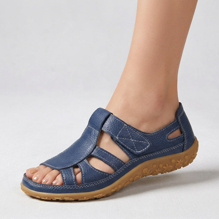 Women's casual footwear: comfortable slip-on sandals with foot support and non-slip sole.