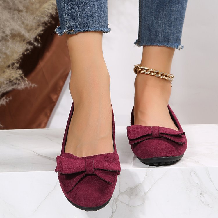 Supportive women's orthopaedic wide fit flats, ensuring comfort and stability with every step.