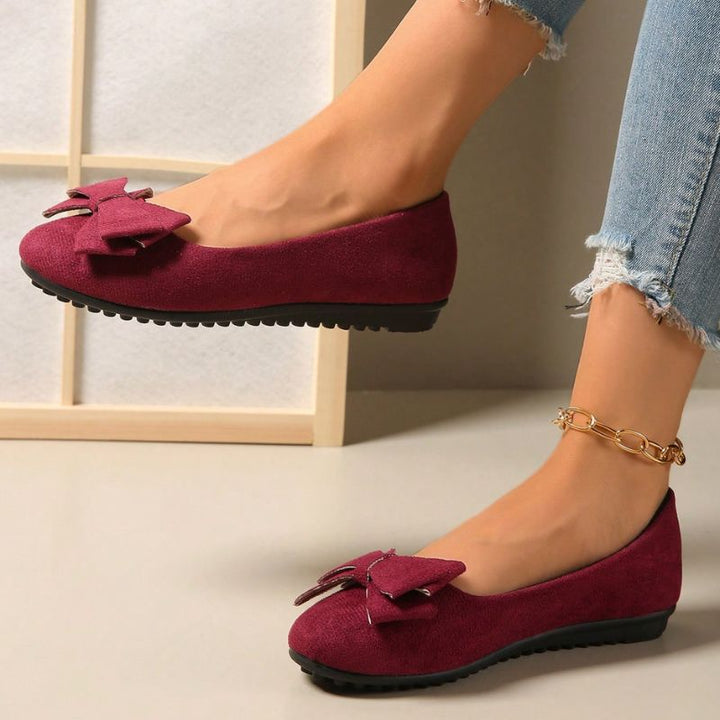 Elegant black ballet flats, women's wide fit, orthopaedic support for comfortable daily wear.