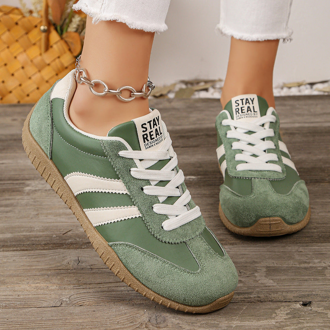 Supportive women's walking shoes, wide fit, offering arch support for foot pain relief.