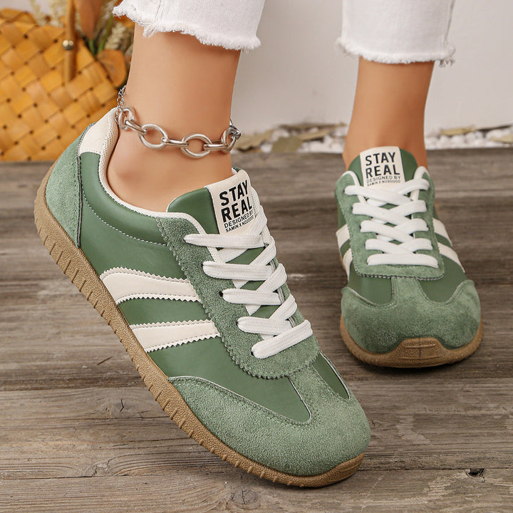 Supportive women's walking shoes, wide fit, offering arch support for foot pain relief.