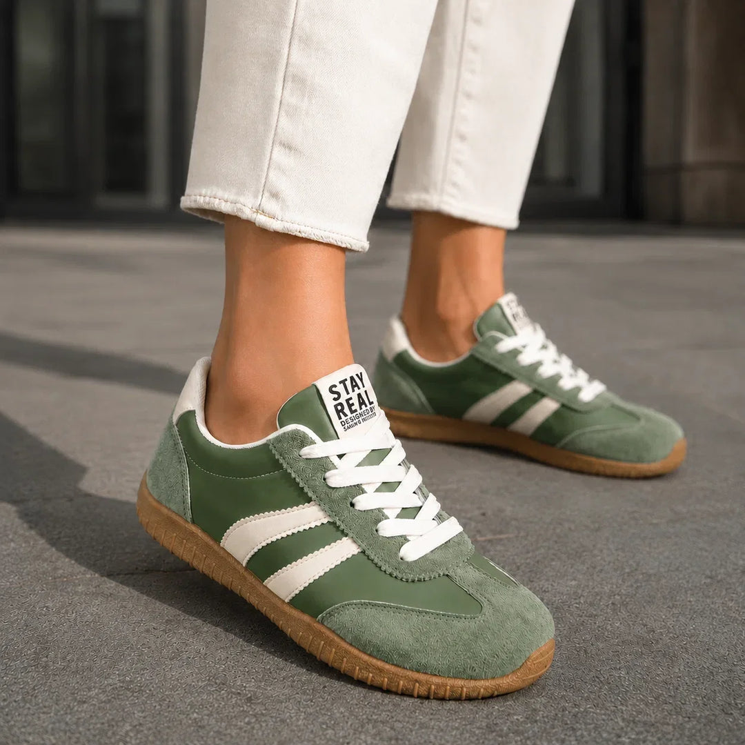 Comfort trainers for women, wide fit design, providing arch support for all-day wear.