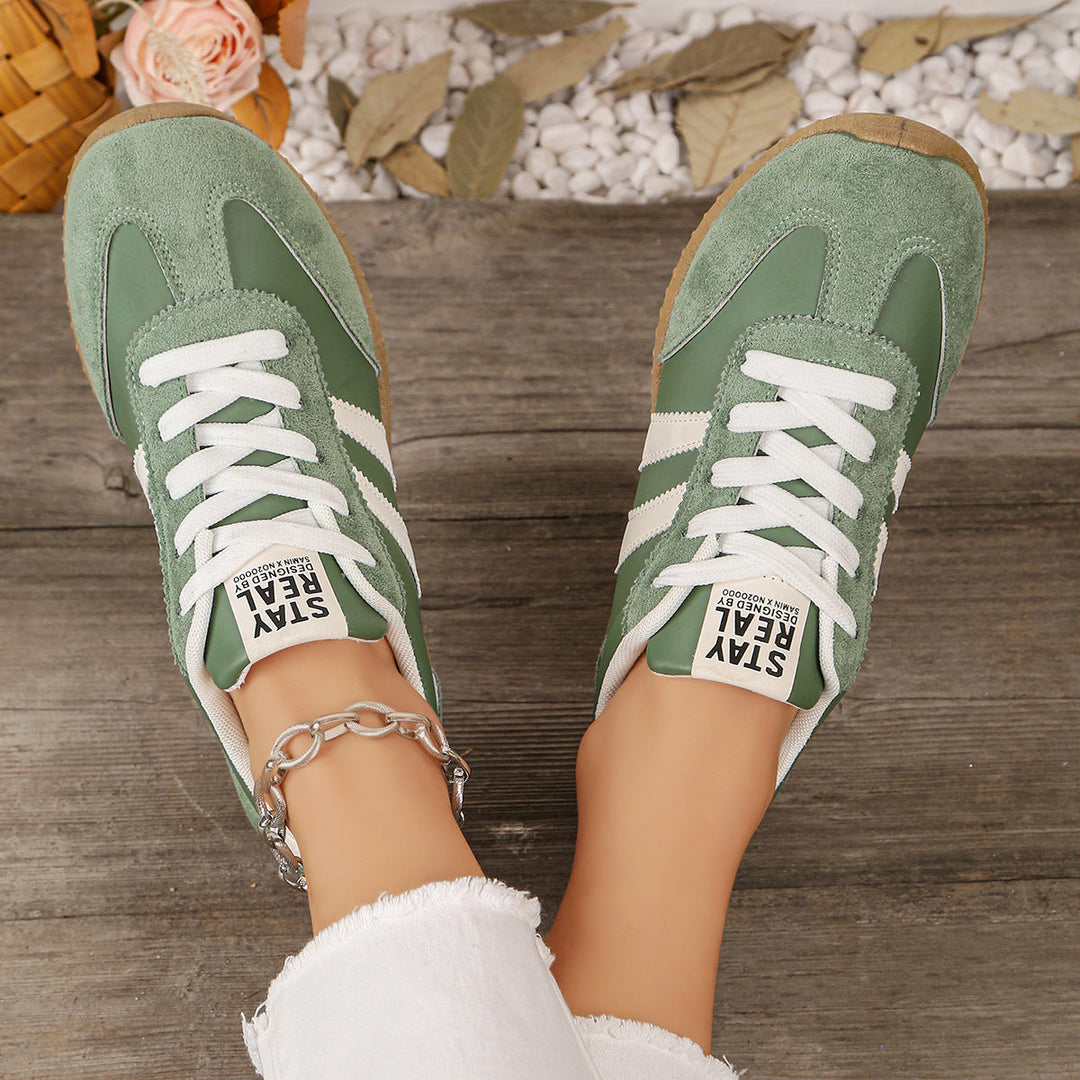 Stylish women's wide fit trainers with arch support, perfect for walking and active use.