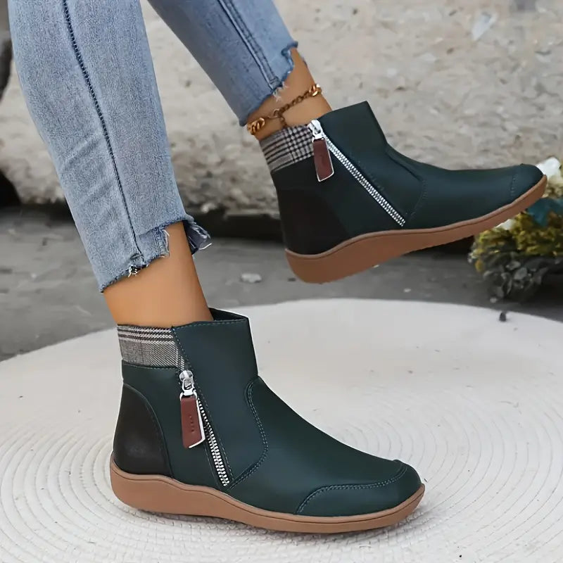 Comfortable women's ankle boots with orthopedic design, arch support & slip-resistant sole.