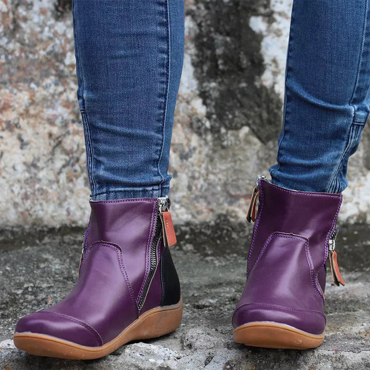 Supportive women's zipper ankle boots for everyday wear, offering pain relief & comfort.