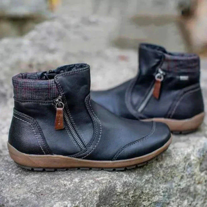 Stylish women's orthopedic ankle boots featuring arch support, ideal for all-day comfort.