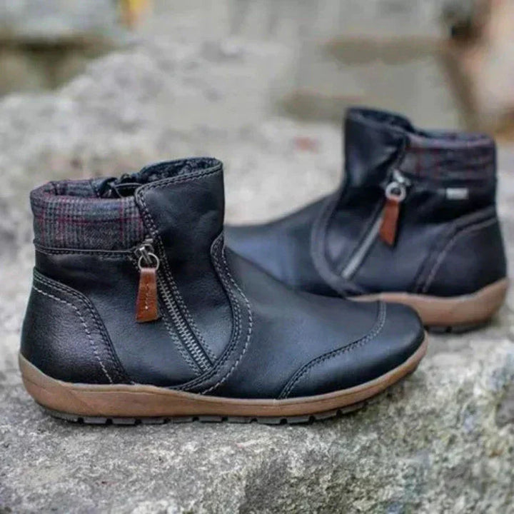 Stylish women's orthopedic ankle boots featuring arch support, ideal for all-day comfort.