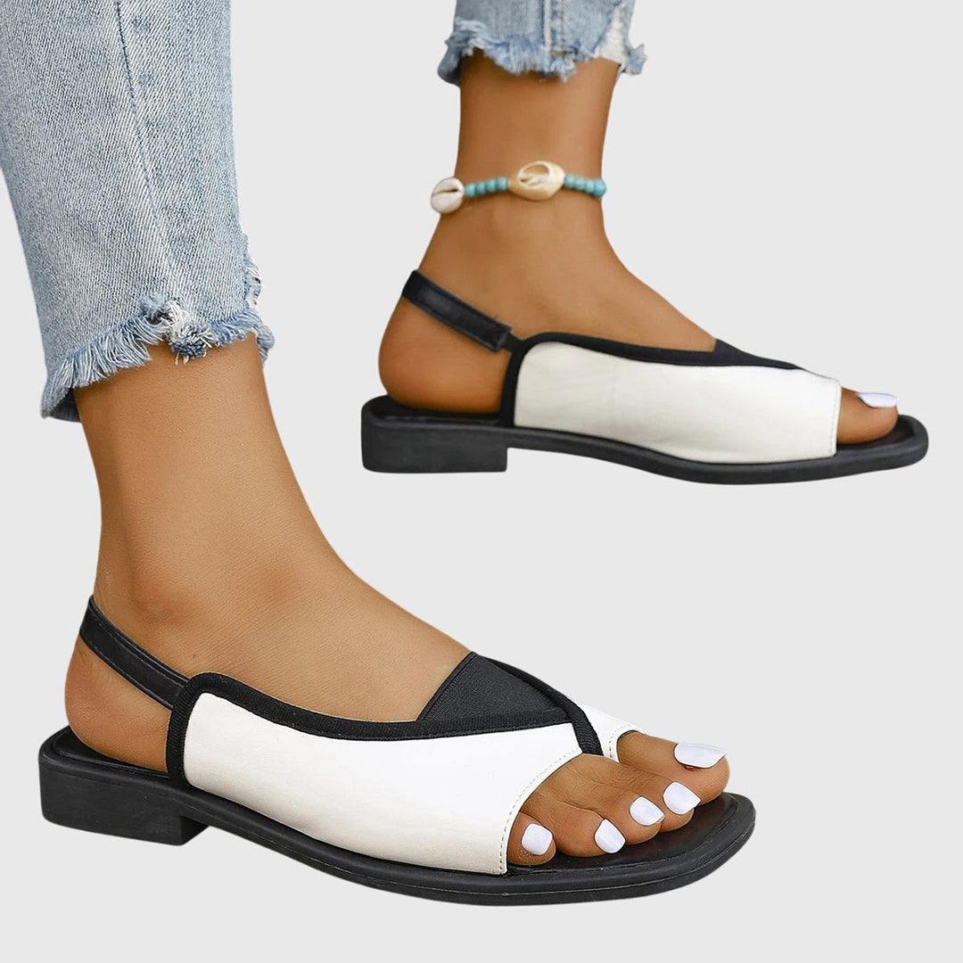 Comfortable women's therapeutic sandals with foot support, cushioning, & open-toe design for summer.