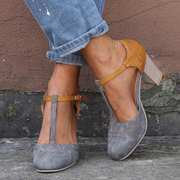 Close-up of women's orthopedic comfort heeled shoes, showcasing arch support and ergonomic design for foot health.