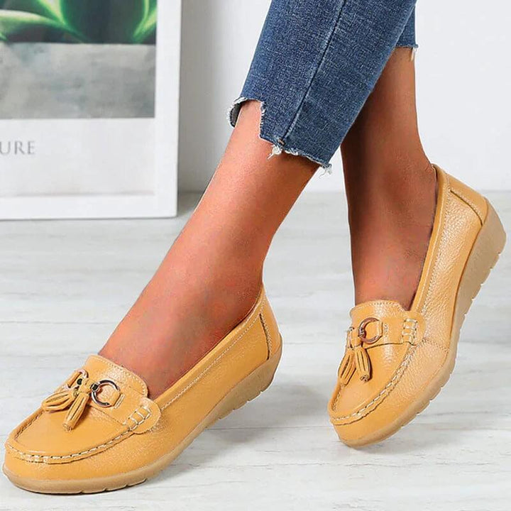 Side profile of stylish women's casual orthopedic loafers, engineered for all-day comfort and arch support.