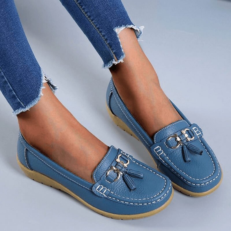 Pair of women's orthopedic slip-on loafers, showcasing a sleek design for easy everyday wear and foot comfort.