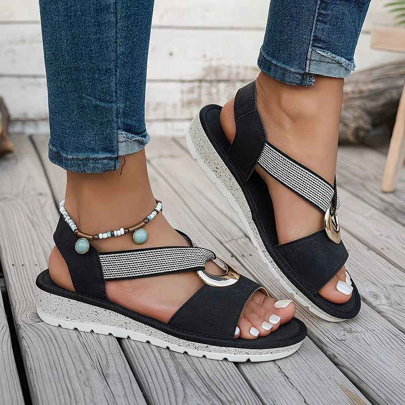 Stylish women's comfort sandals with a supportive orthopedic footbed and easy-adjust flexible strap.
