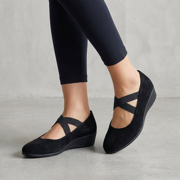 Women's orthopedic criss-cross strap wedge flats for comfortable, stylish summer walking.