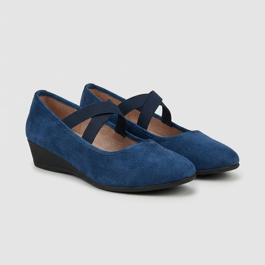 Modern women's orthopedic criss-cross strap wedge flats with arch support for comfortable daily wear.