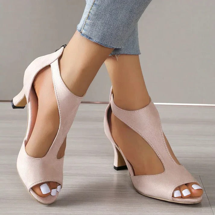 Stylish pink cushioned high heels for women, providing orthopedic foot support and comfort.