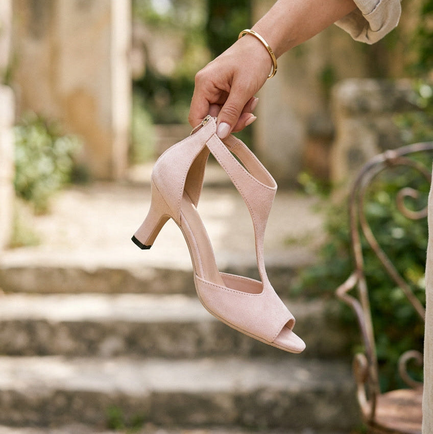 Sleek black orthopedic high heel shoes for women, designed for stylish comfort and support.