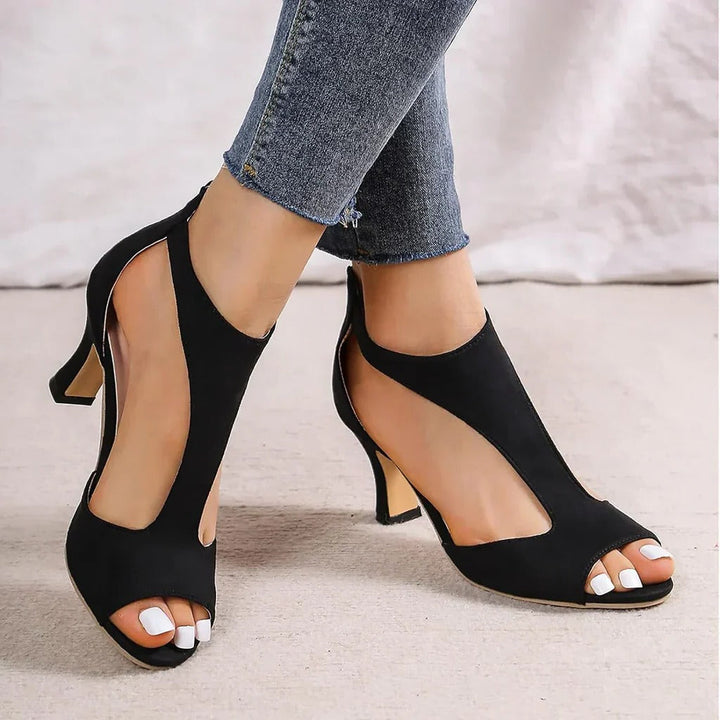 Orthopedic high heels for women, available in black or pink, with cushioned foot support.