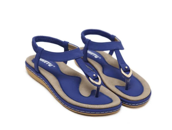 Flat orthopedic sandals for women with arch support, perfect for comfortable daily wear and summer activities.