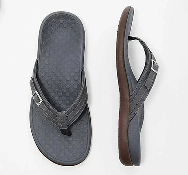 Supportive women's flip-flops for pain relief, featuring orthopedic arch support & a cushioned footbed for comfort.