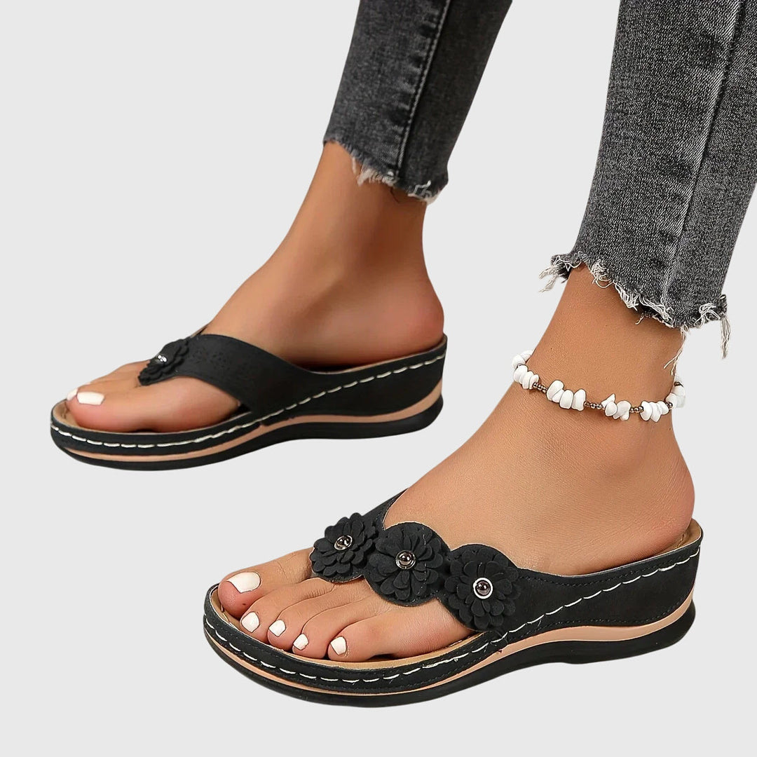 Supportive women's orthopedic sandals with arch support, ensuring all-day comfort & foot relief.
