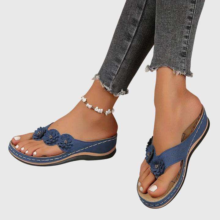 Versatile women's flip flops with arch support, ideal for casual wear, vacation & all-day comfort.