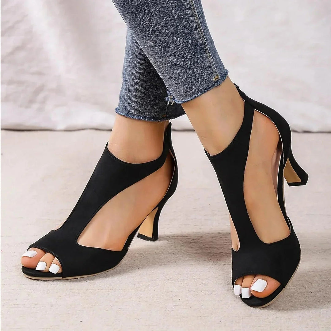 Stylish women's orthopedic mid-heel shoes with T-strap design for ultimate comfort & fashion.