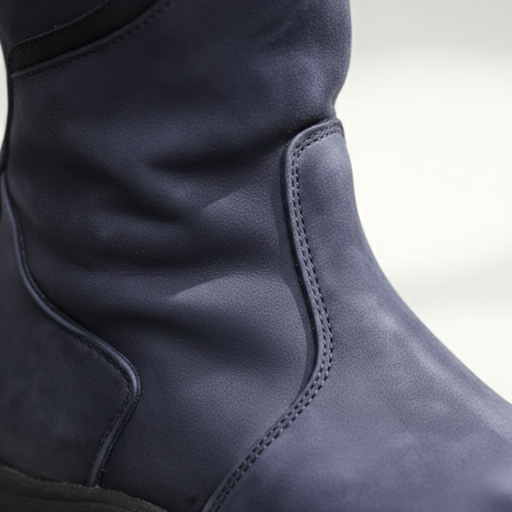 Stylish green women's orthopedic knee-high waterproof boots, designed for comfort and winter durability.