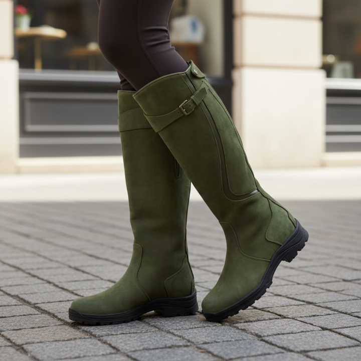 Comfortable women's waterproof knee-high boots with orthopedic support, perfect for cold, wet winter days.