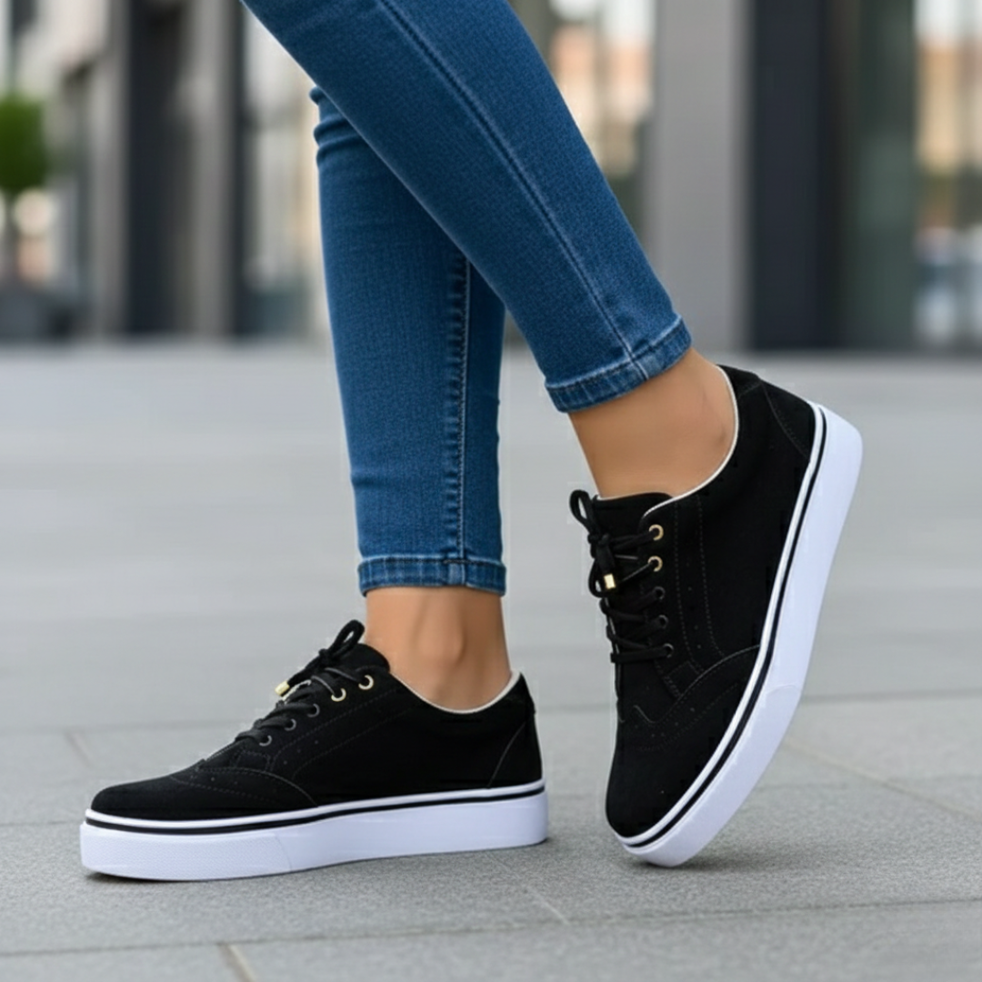 Women's low-top orthopedic walking sneakers, supportive comfort footwear with a stylish perforated design.