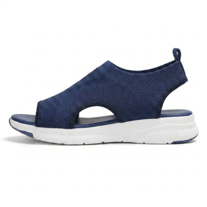 Women's orthopedic summer sandals with a supportive wedge & mesh upper.